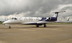 Exterior of Embraer with white and navy paint