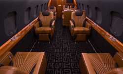 Black interior with warm caramel upholstery in Global Express