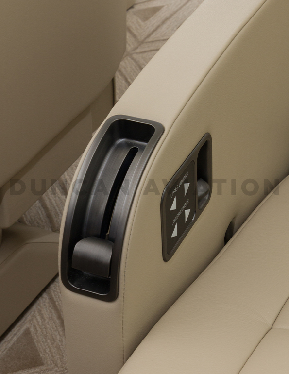 Extreme close up of chair controls in refurbished Falcon 2000