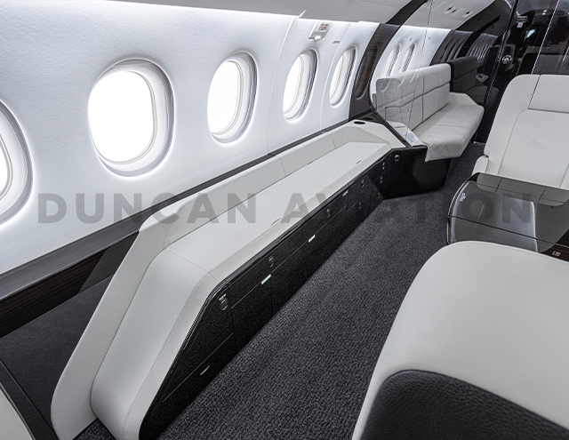 White drink rail in modern interior refurbishment of Falcon 2000