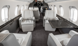 Dark gray and white interior of Global Express