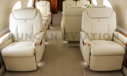 Interior of Gulfstream 650 with cream leather captain chairs