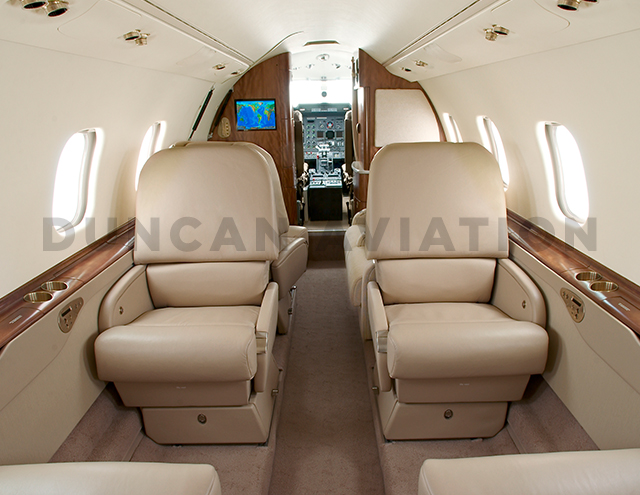 Learjet 60 updated interior in warm light brown