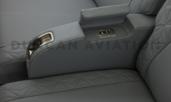 Close up of arm rest with access shown to additional controls