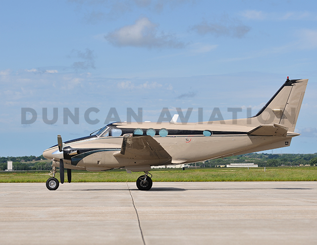 King Air C-90 exterior paint in light brow and black