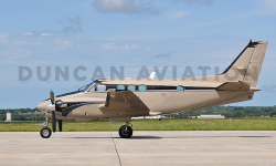 King Air C-90 exterior paint in light brow and black