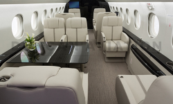 Falcon 2000 with updated cream upholstery and dark wood finishes