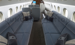 Blue velvet upholstery on facing divans in Falcon 900