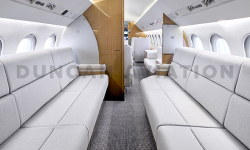 Matching divans inside refurbished interior of Falcon 900