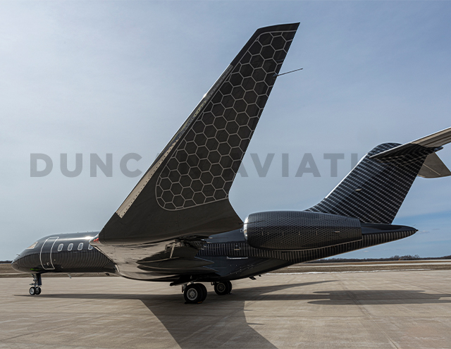 Black paint with gold honeycomb accent on Global aircraft