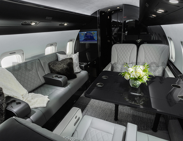 Challenger 604 interior in shades of gray and black