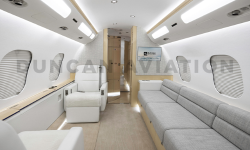 White, bright, and cozy interior of GLEX aircraft