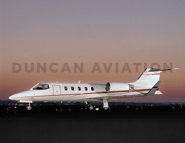 Learjet 31 exterior paint in white with brown accent