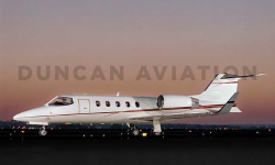 Learjet 31 exterior paint in white with brown accent