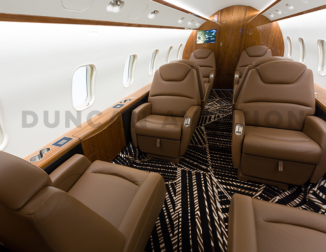 Interior of Challenger 300 with warm brown finishes