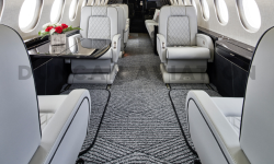 Sleek black and white interior of updated Falcon 2000