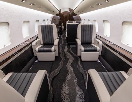 Interior of fully refurbished Global including carpet, chairs, and drinkrails
