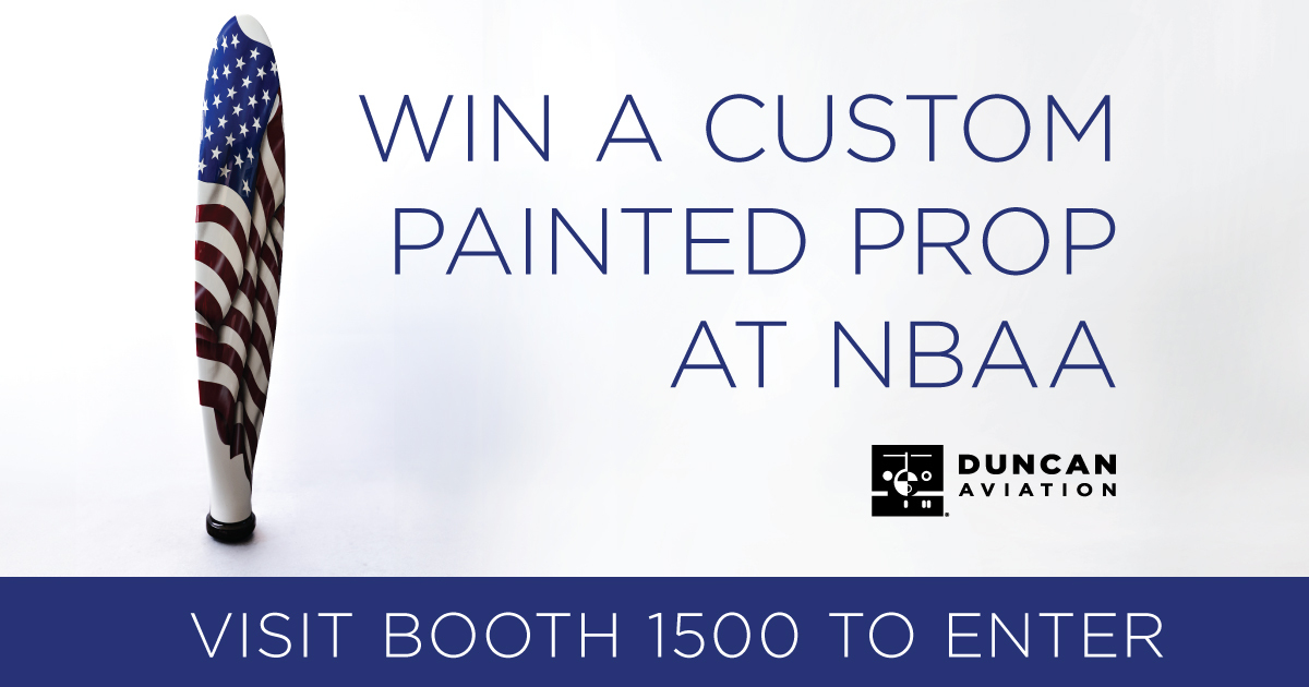 Duncan Aviation Holding Giveaway for Painted Prop at NBAA Duncan Aviation